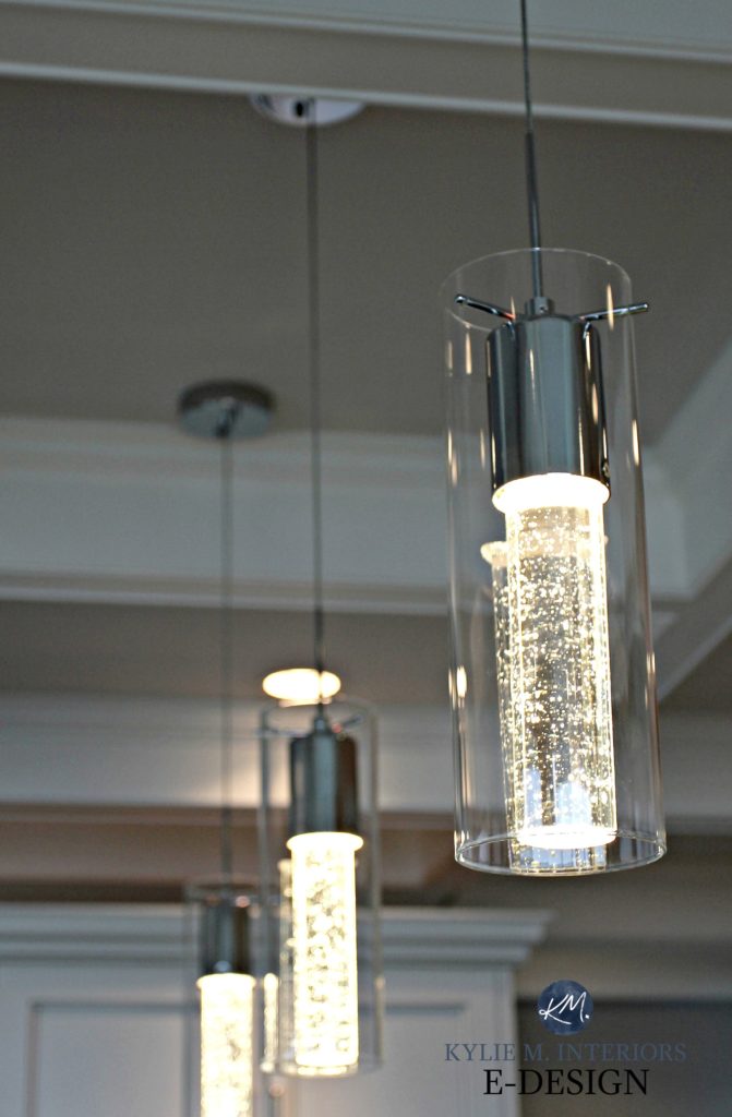 Champagne glass style pendant lights over island. Kylie M E-design