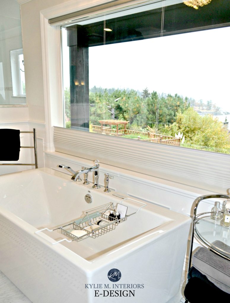 Free standing tub in ensuite bathroom. Glam bathroom with ocean view. Kylie M Interiors E-design