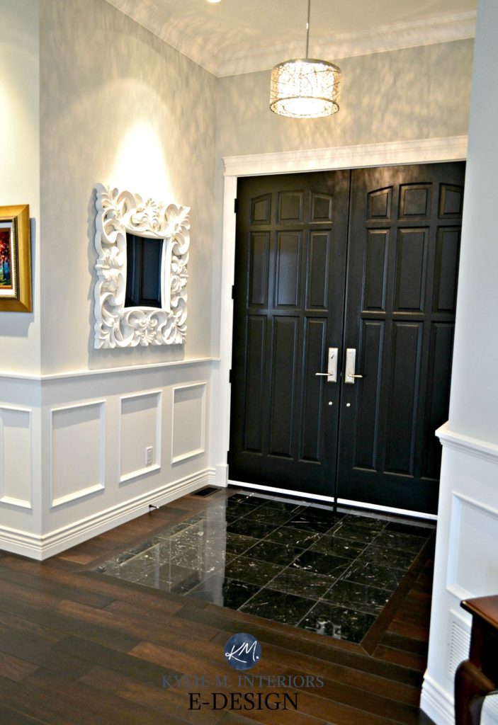 Interior front doors painted black, double, marble floor with dark wood. Stonington gray paint. Kylie M E-design