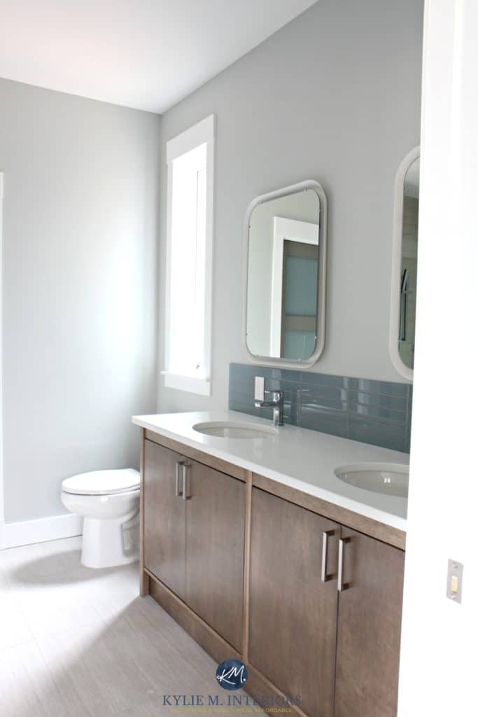 Benjamin Moore Stonington Gray on the walls of a bathroom wtih double sink and white quartz. Custom made wood vanity and tile floor. Kylie M Interiors Online Colour Consulting services - Copy