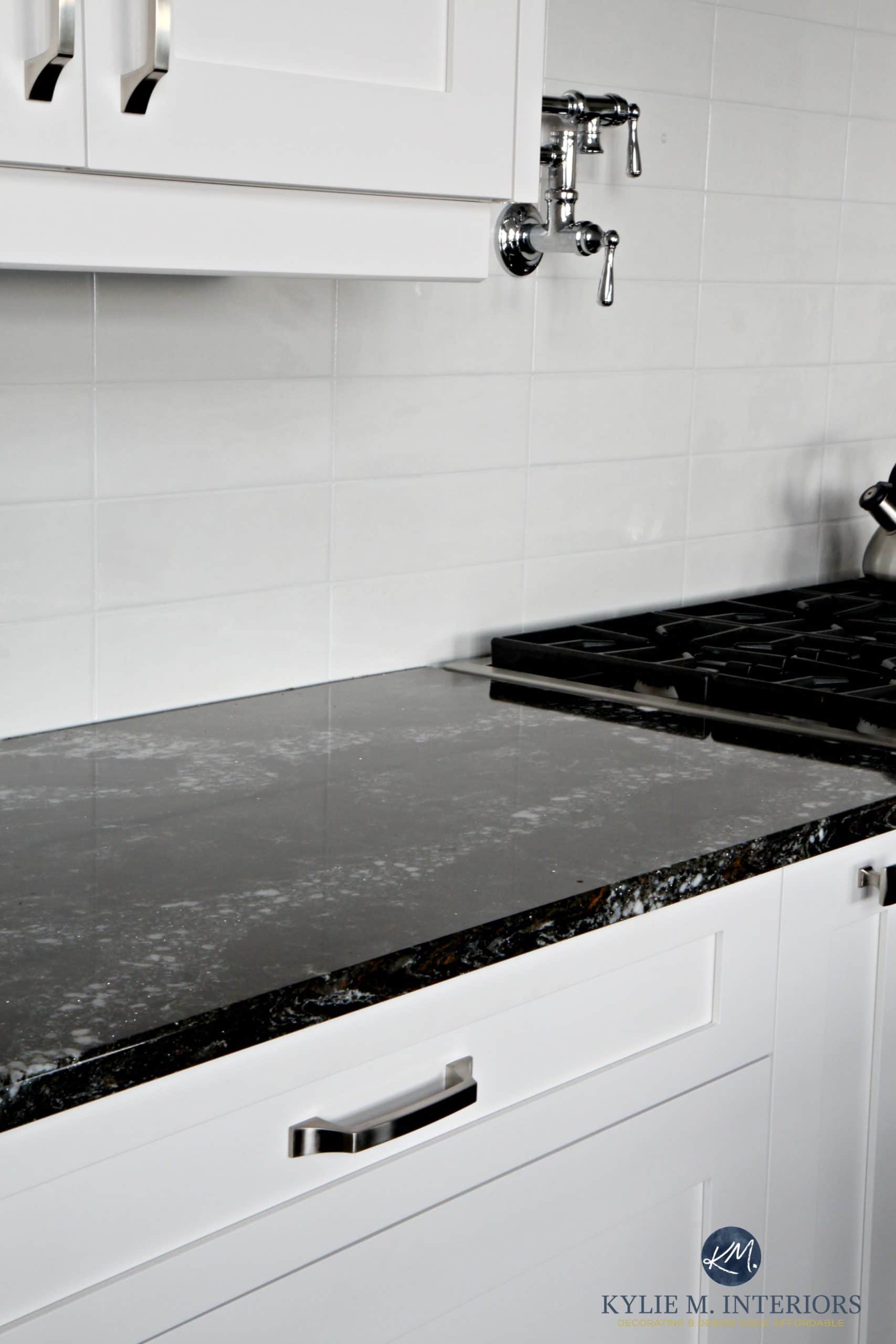Cambria Ellesmere black quartz countertop, white kitchen and offwhite light gray