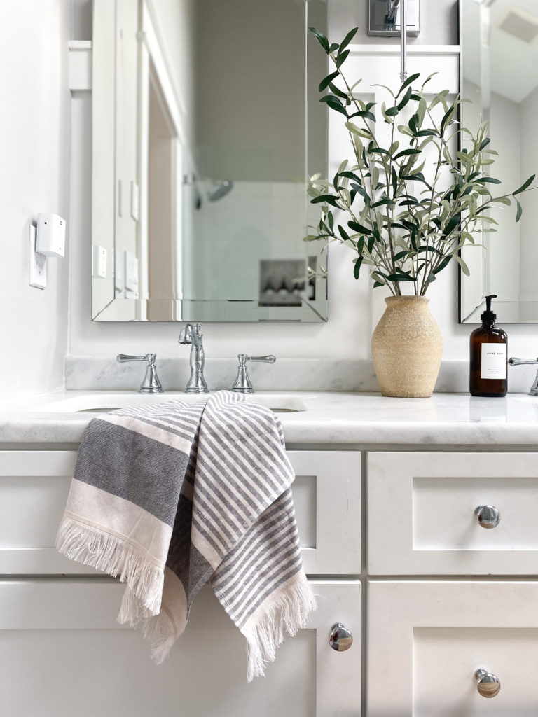Bathroom vanity Sherwin Williams High Reflective White, marble look white countertop, home decor, mirrors and hardware. Kylie M Interiors Edesign, Jenna Christian home