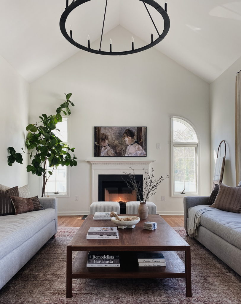 Living room, vaulted ceiling, fireplace, neutral transitional style home decor and furniture. Sherwin Williams Alabaster warm white, Kylie M Interiors, Jenna Christian