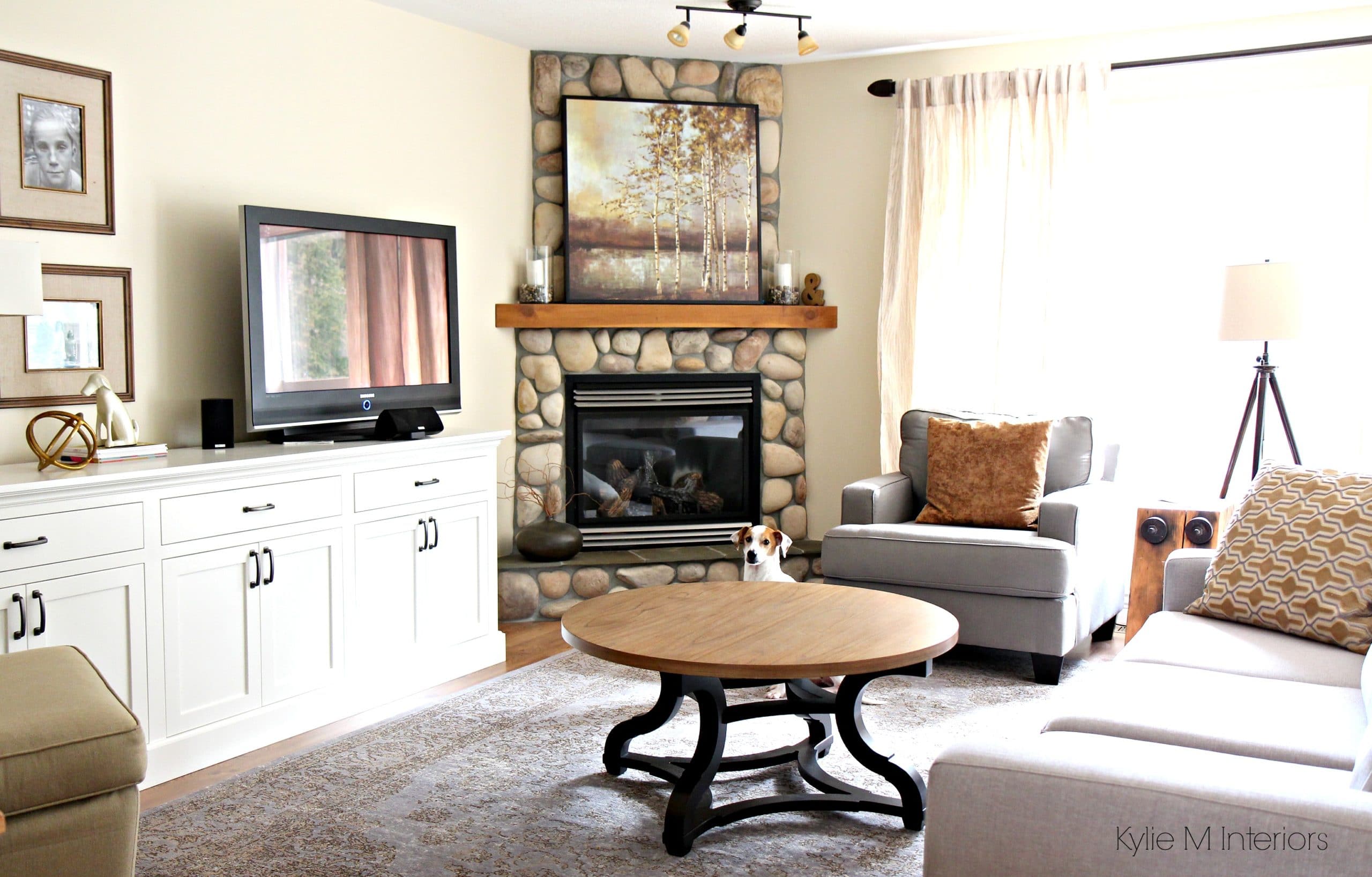 Living room with corner stone fireplace, custom tv cabinet ...