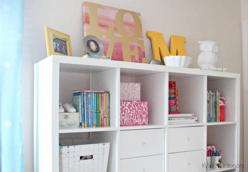 ideas to decorate and organize a girls bedroom with pink, brass, blue, yellow. good storage idea and craft or homework area