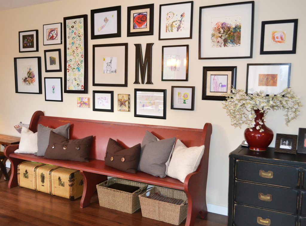 Ideas to personalize a home with a kids art gallery wall above a painted church pew. Kylie M Interiors