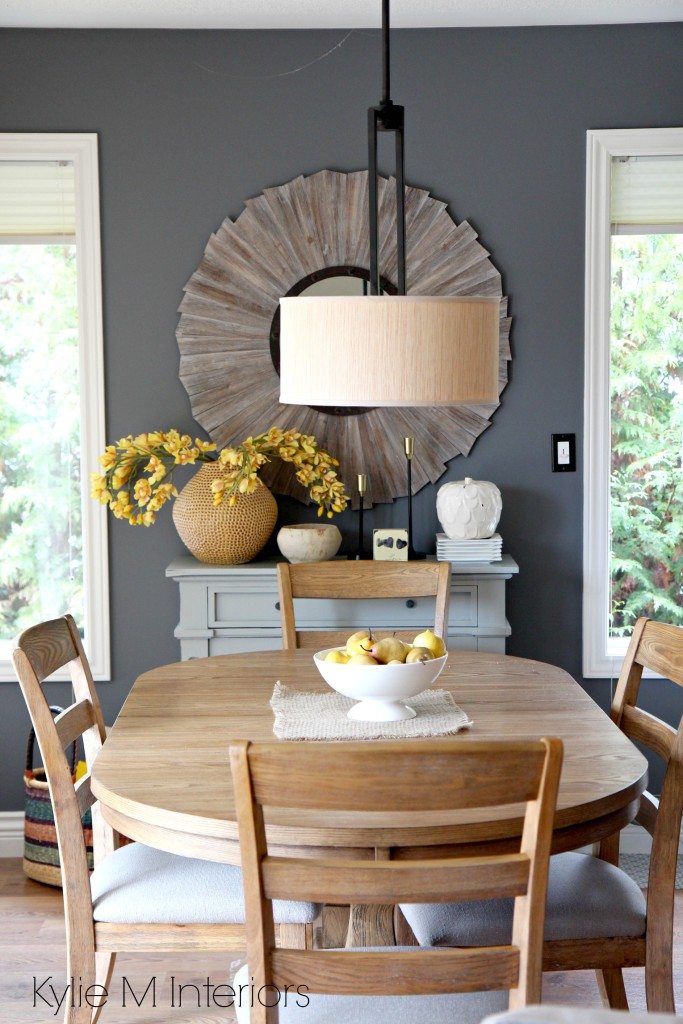 Benjamin Moore Gray on dining room feature or accent wall. Country or farmhouse style home decor with yellow gold accents and warm, light wood tones like oak