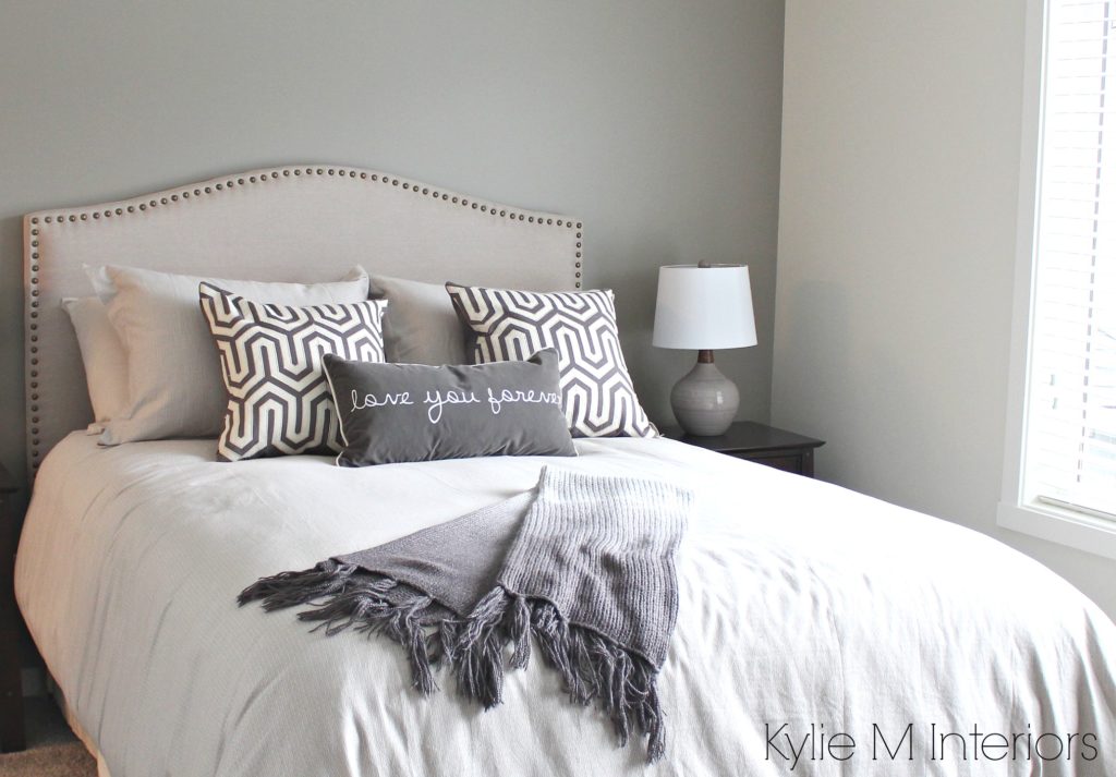 Bedroom with south west exposure painted in gray to accommodate for natural light. Sherwin Williams Dorian Gray feature wall by Kylie M Interiors