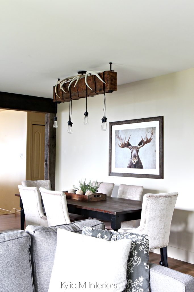 Rustic country or hunting decor in a dining room. Benjamin Moore Grant Beige. Design by Color Consultant Kylie M Interiors
