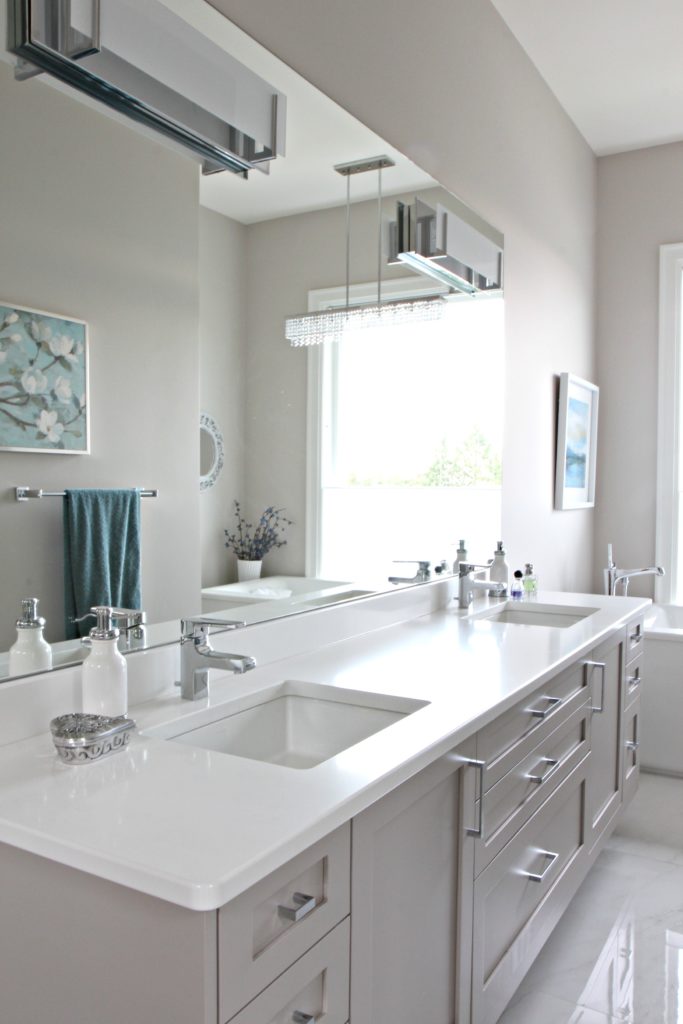 bathroom-with-floating-gray-vanity-cambria-quartz-countertop-kirkstead-benjamin-moore-balboa-mist-large-mirror-kylie-m-interiors-decorating-and-design-online-and-nanaimo