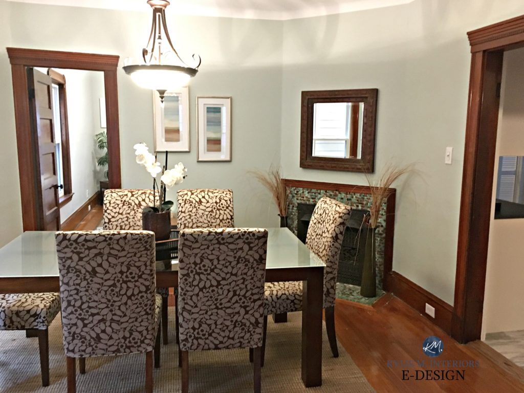 Best paint colour dark wood trim and floor. Kylie M Interiors E-design, online colour consultant. Sherwin Williams Sea Salt in dining room with fireplace