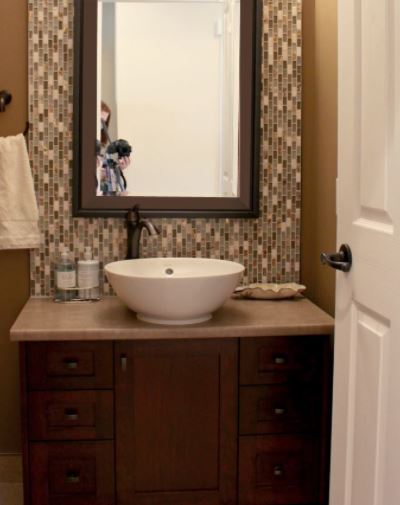 powder room small bathroom, warm colours, laminate beige countertop, mosaic tile backsplash, dark wood vanity. Kylie M Interiors Edesign