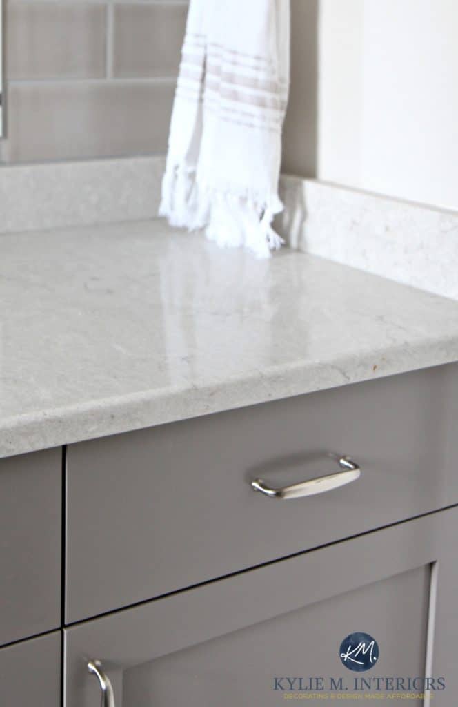 Caesarstone bathroom countertop Bianco Drift with gray and greige tones. Maple vanity painted Benjamin Moore Metropolis. Kylie M Interiors E-design and Color Consulting