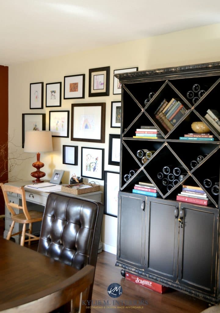 Benjamin Moore Gentle Cream paint colour. With kids art gallery on the wall and black wine cabinets. Kylie M Interiors E-decor and Online Colour Consulting