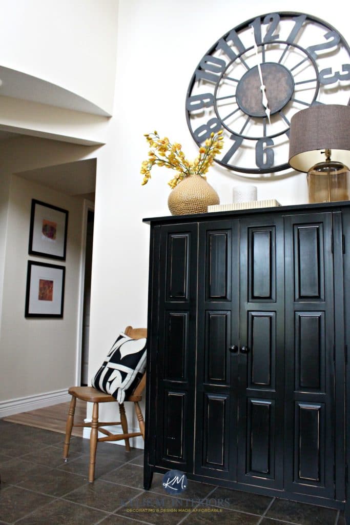Benjamin Moore LRV and undertones. Shown in entryway with large metal clock and black armoire. Kylie M Interiors Online Colour Consultant and expert
