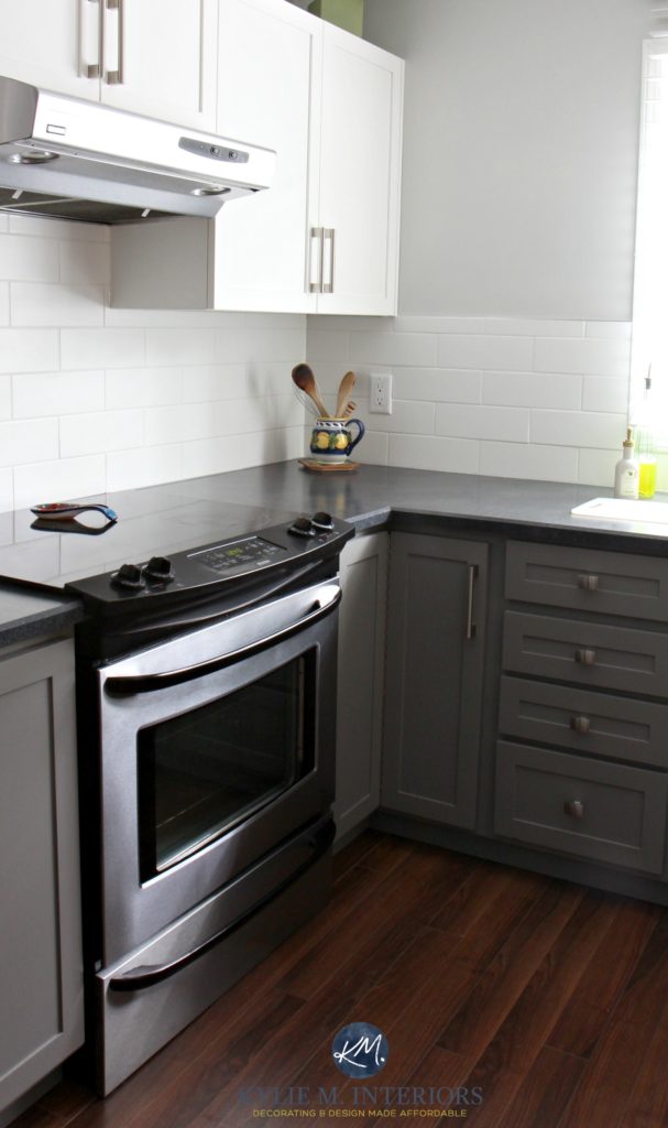 Red toned wood flooring with BEnjamin Moore Chelsea Gray painted cabinets, Gray Owl and white subway tile. Kylie M Interiors E-design and E-decor
