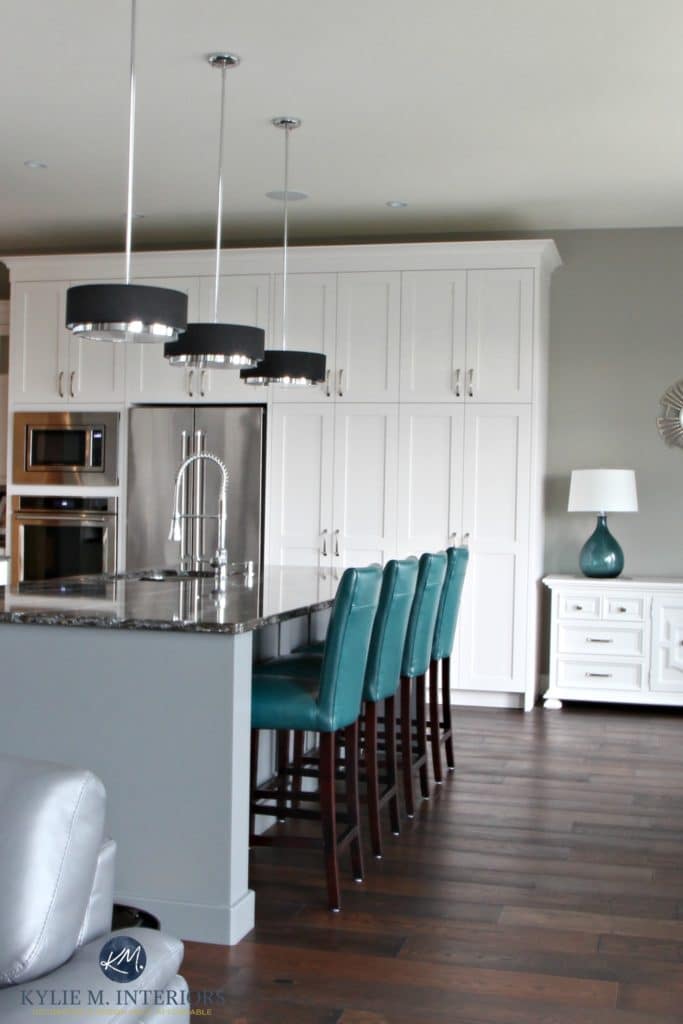 Contemporary white kitchen with gray painted island in Cambria Ellesmere. Dark wood floors and Sherwin Williams Dorian Gray. Kylie M Interiors E-decor and virtual design