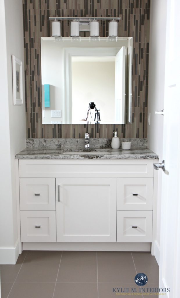 Small bathroom decorating idea. Glass mosaic tile on wall behind vanity. Cambria Galloway. Kylie M Interiors. E-decor and Online Color consulting. Based in Nanaimo Bc
