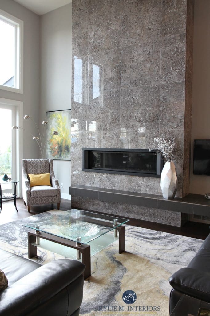 Tile 2 storey fireplace. Sherwin Williams Repose Gray. Contemporary modern fireplace. Gray and yellow colour palette. Kylie M Interiors E-decor and Online Color Consulting