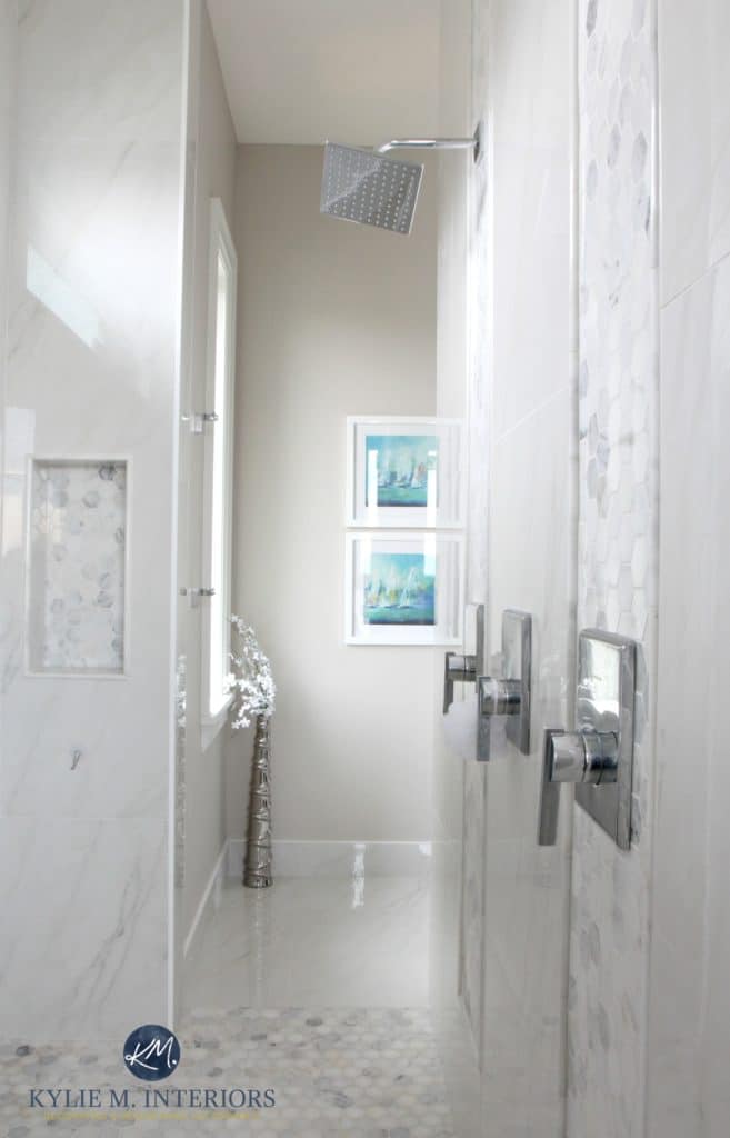 Walk in shower, ensuite bathroom. Marble hexagon mosaic tile floor, porcelain walls, Benjamin Moore Balboa Mist. Kylie M Interiors