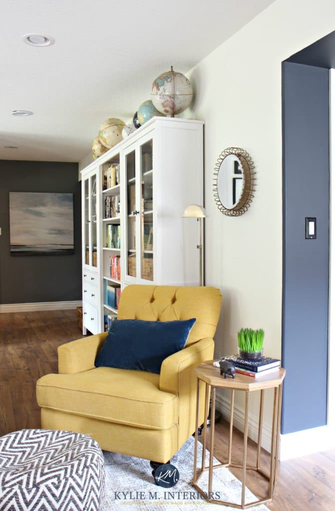 Chartreuse accent chair with blue accent wall. Ikea Hemnes bookcases and Sherwin Williams Creamy. Kylie M INteriors E-design and Online Color Consulting