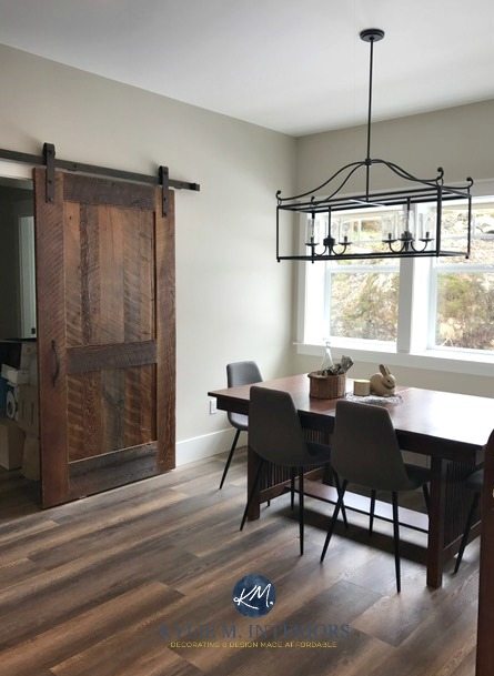 E-design and online colour consulting by Kylie M Interiors. Benjamin Moore Baby Fawn with wood sliding farmhouse style barn doors in dining room with chandelier