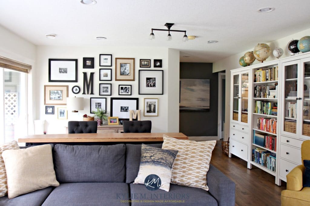 Family room with photo gallery wall, gray sectional, ikea hemnes white bookcases. Sherwin Williams Creamy and home decor. Kylie M Interiors Colour expert and Canadian e-design blogger