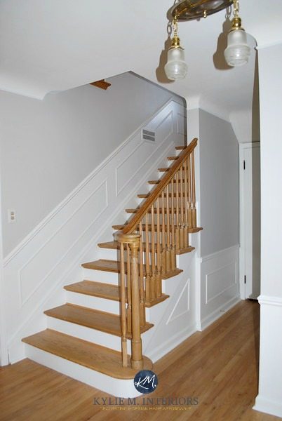 Sherwin Williams Big Chill with white wainscoting on stairs. Oak floor, railing. Kylie M Interiors E-design, E-decorating and online color consultant