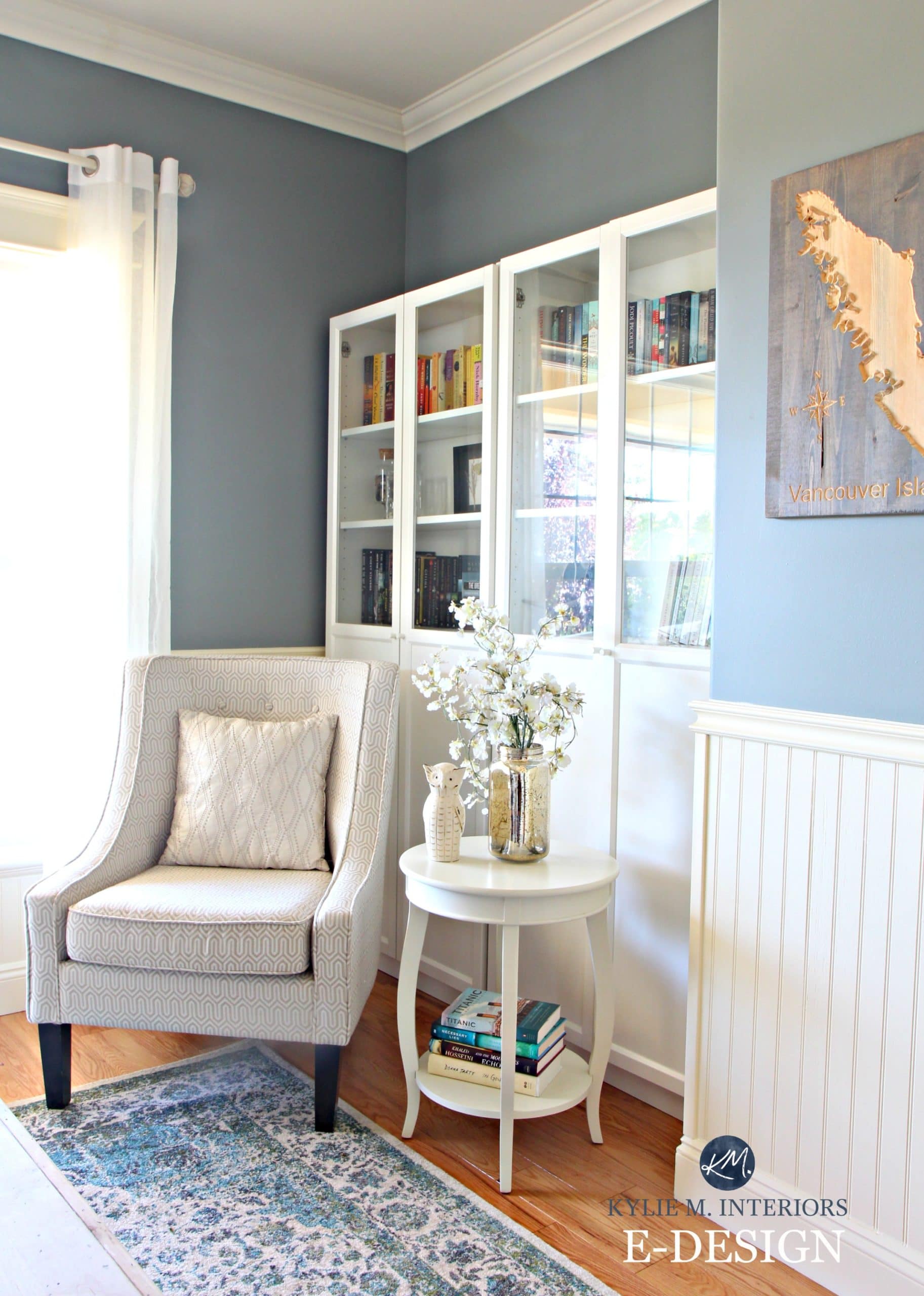 Best blue gray paint colour. Benjamin Moore Sea Pine, Stonybrook, Ikea bookshelves and accent chair. Cream white wainscoting. Kylie M E-design