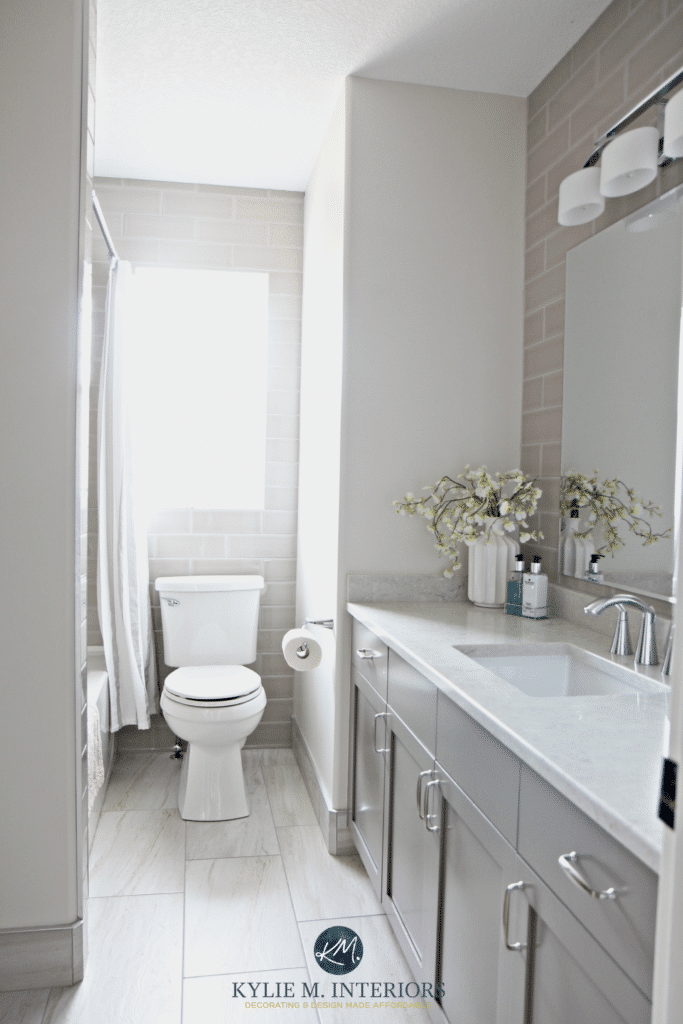 Bathroom update, Benjamin Moore Classic Gray and Metropolis vanity, Bianco Drift quartz and gray subway tile by Kylie M Interiors