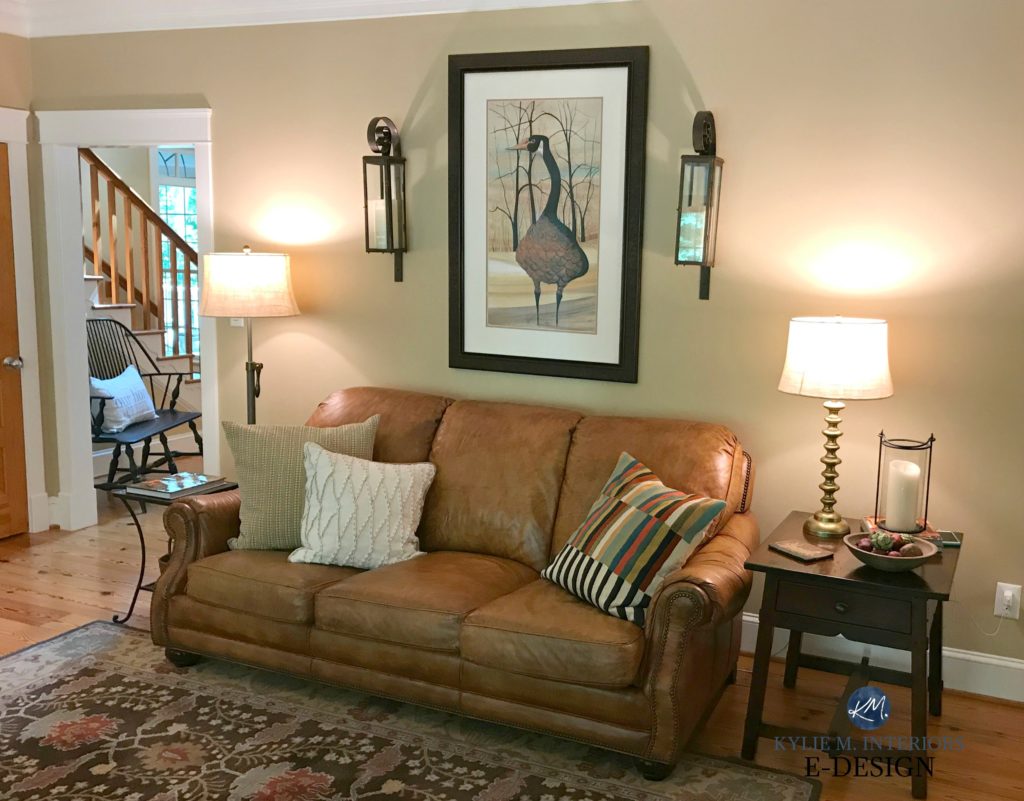 Benjamin Moore Lenox Tan, farmhouse country style living room, brown leather couch. Pine floor and door. Kylie M E-design and Virtual, online color consultant