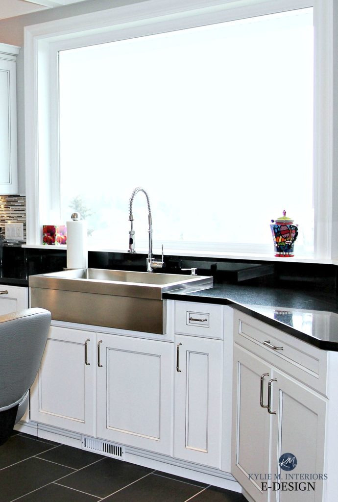 White glazed cabinets, black granite, stainless farmhouse sink. Design after natural disaster. Kylie M Interiors E-design