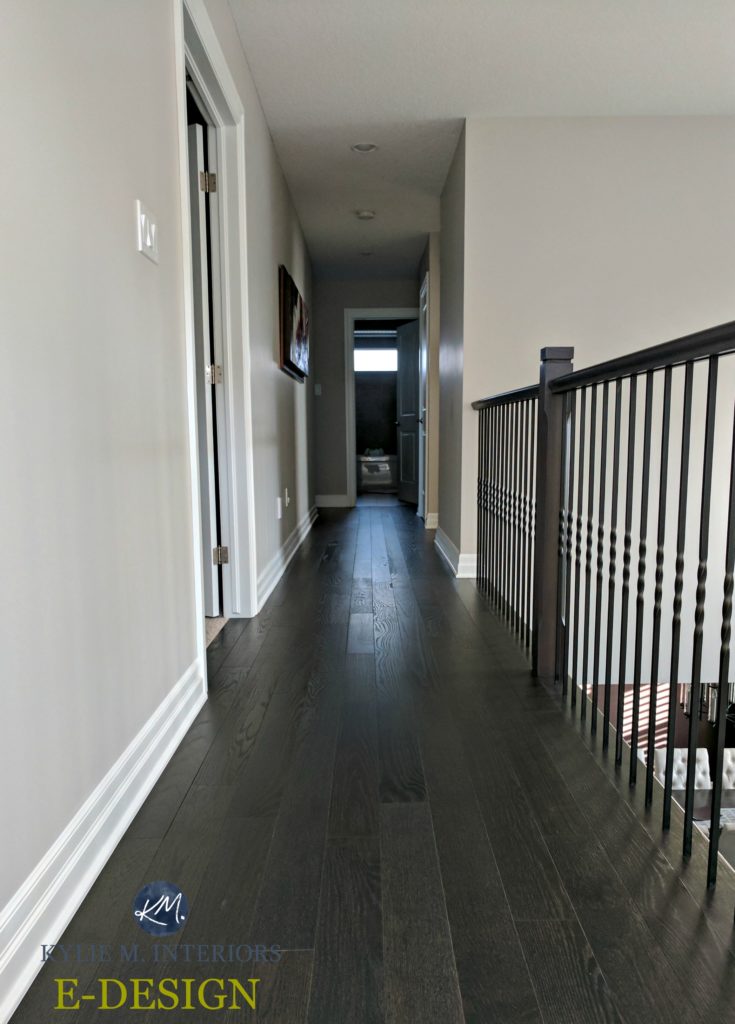 E-design and online colour consultation by color expert and blogger Kylie M INteriors. Benjamin Moore Collingwood in a hallway with dark wood flooring and black metal railing