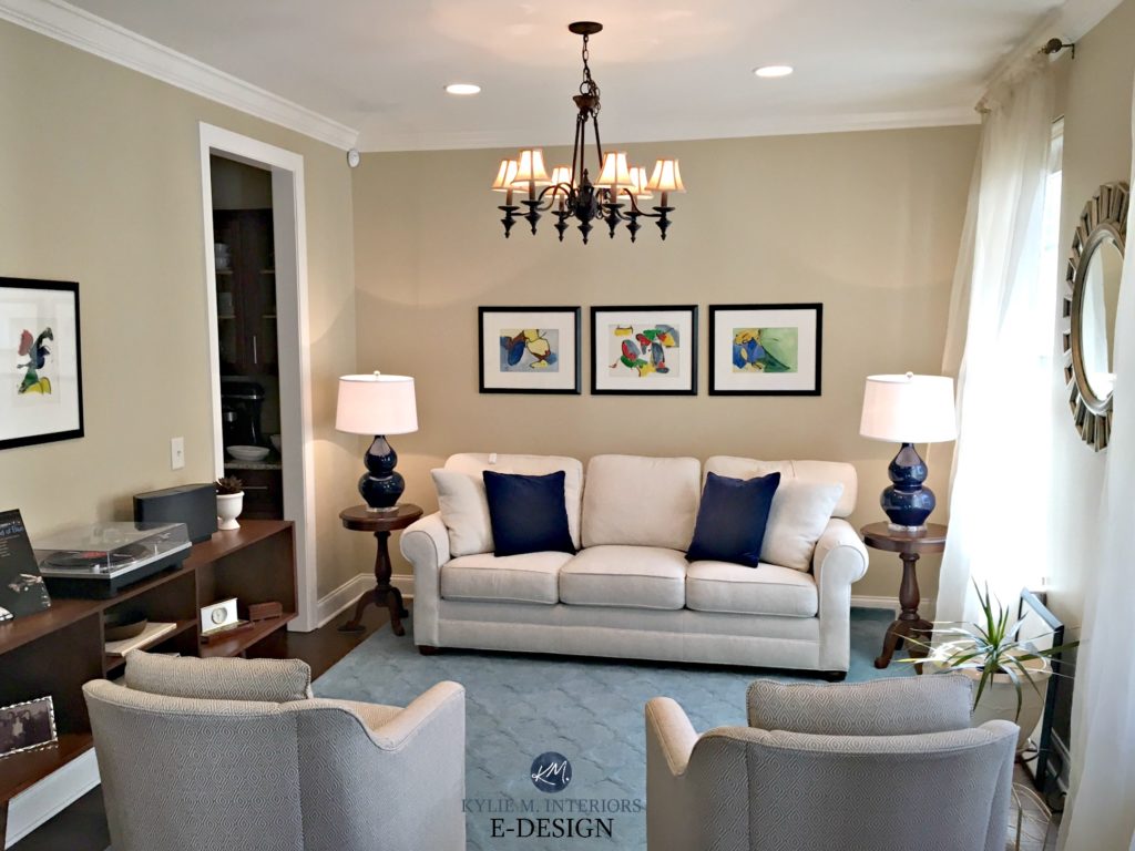 Home staging in living room with balance, navy blue accents. Similar to Sherwin Williams Sandbar. Kylie M E-design