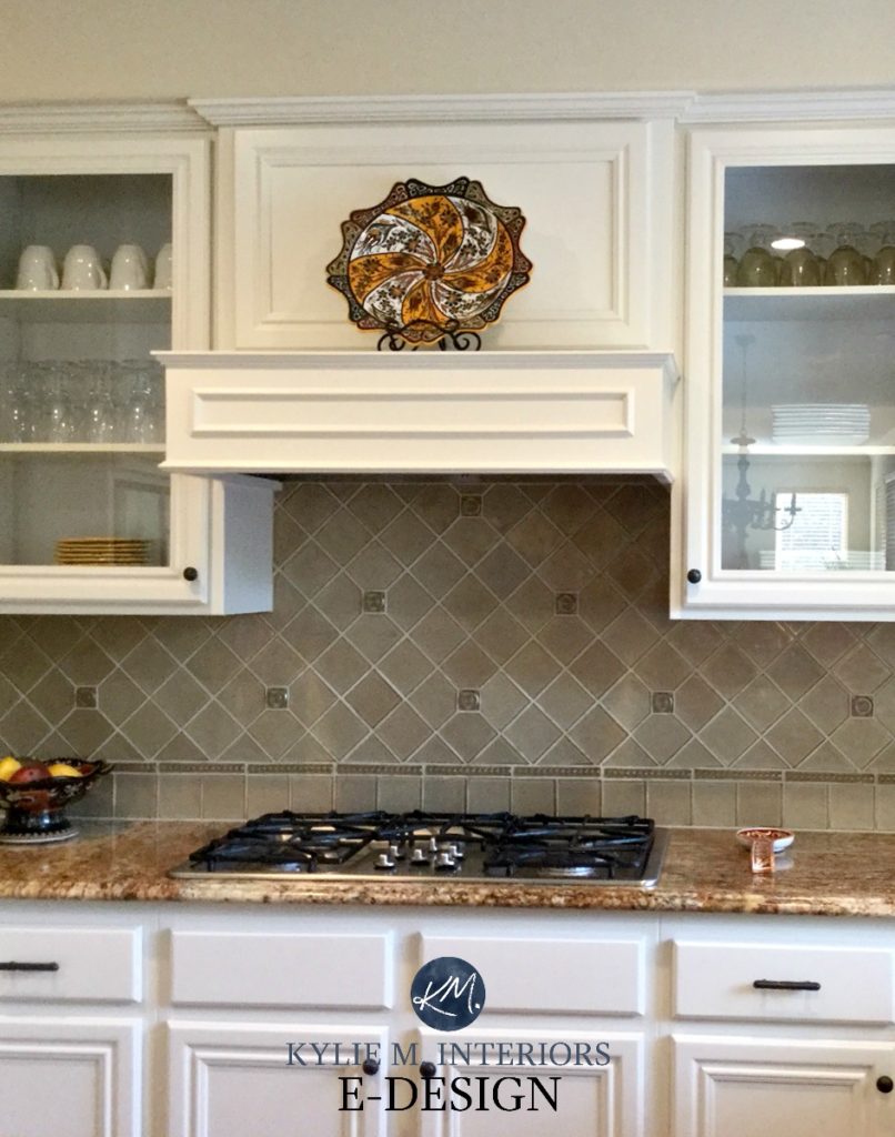 Kitchen maple wood cabinets painted White Down Benjamin Moore, shiny porcelain backsplash tile, granite countertops. Kylie M Interiors E-design