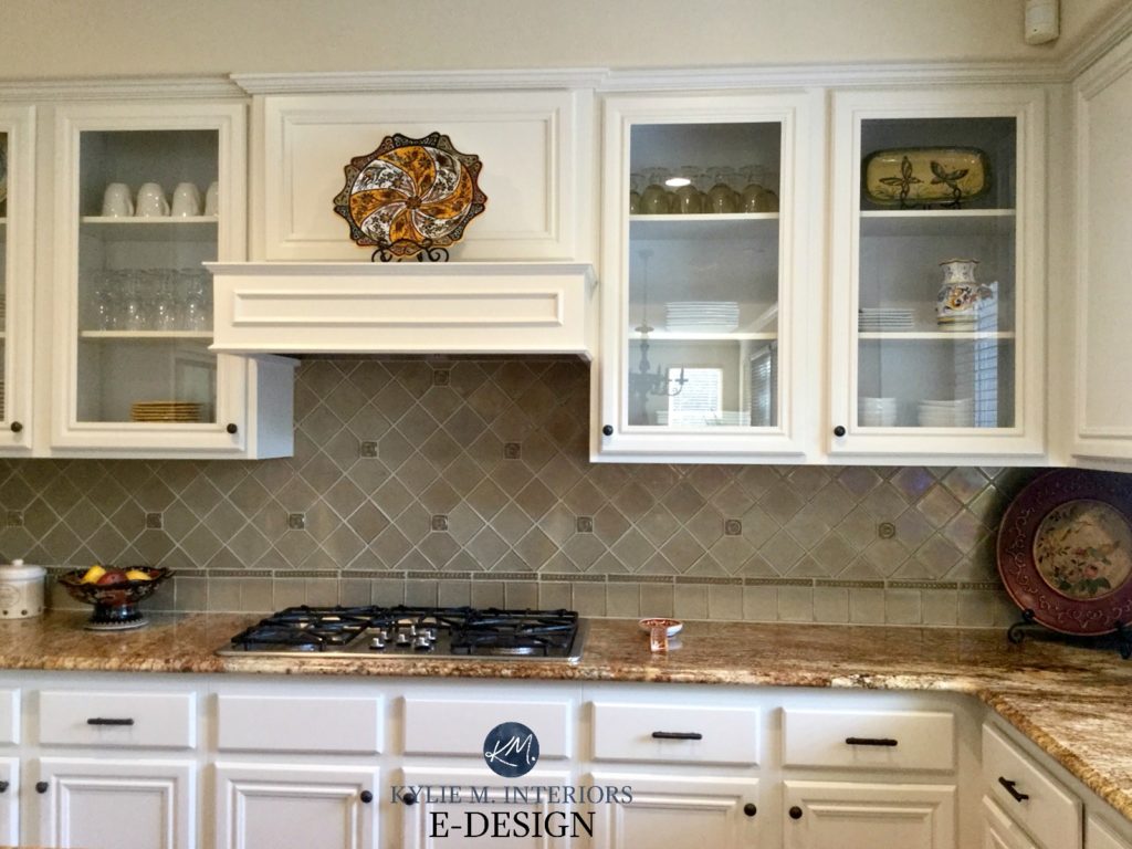 Maple wood kitchen cabinets painted White Down Benjamin Moore. Kylie M E-design, online virtual paint consulting. Granite countertop, backsplash, glass cabinets, wood flooring