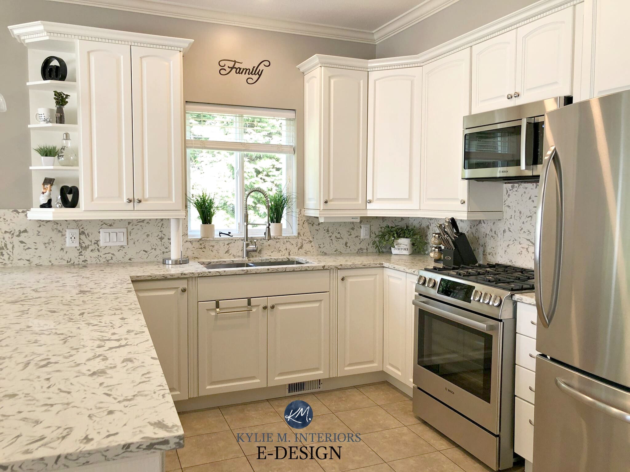 Kylie M Interiors Edesign, online consulting. Oak cathedral arched style cabinets updated and painted with Benjamin Moore White Dove, TCE Quartz 3001, beige porcelain tile, stainless steel.