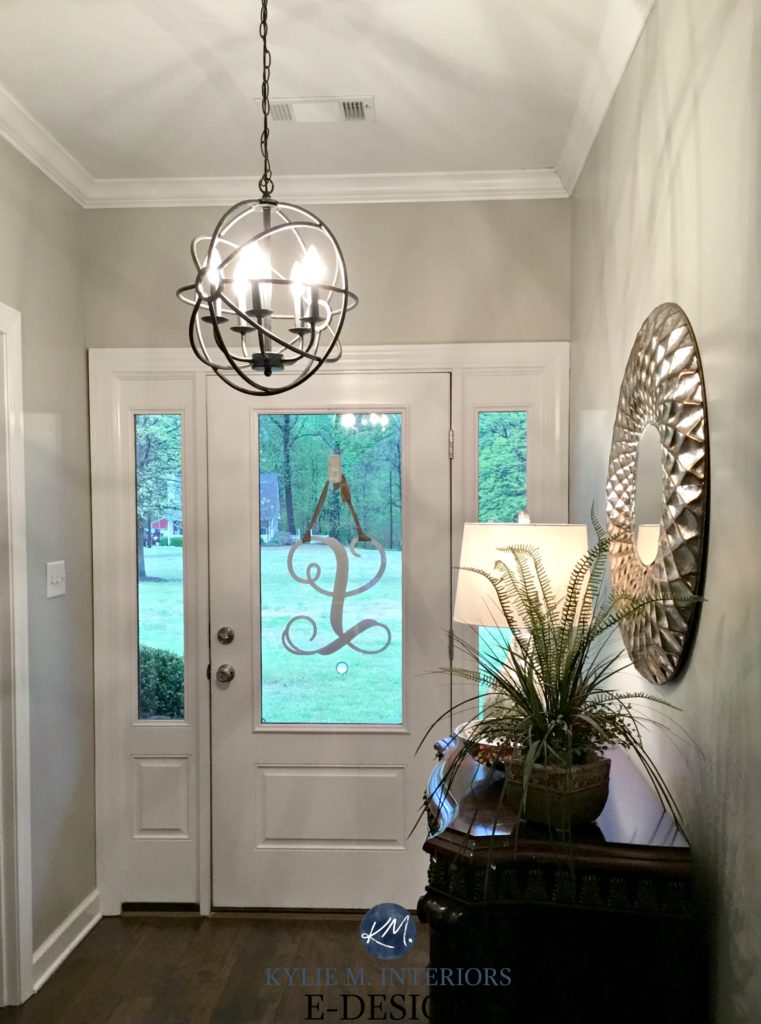 Sherwin Williams Anew Gray entryway, Greige paint colour, white front door, chandelier and mirror. Kylie M INteriors Edesign, virtual online paint colour consulting. Client before photo
