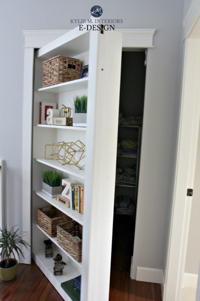 Bookshelf that opens into a closet. Kylie M INteriors Edesign, online paint color exper and decorating blog. Client diy