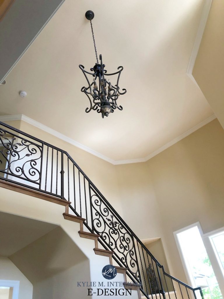 What colour paint ceiling. Desert Tan walls, Timid White trim, close to Rich Cream ceiling. staircase with wrought iron and vaulted ceiling. Kylie M Interior Edesign, golden paint color