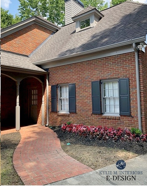 Brick exterior with gray roof. Red brick with orange. Gray trim and house colour with dark blue charcoal shutters - BM Wrought Iron. Kylie M INteriors Edesign, online paint color consultiong, blog