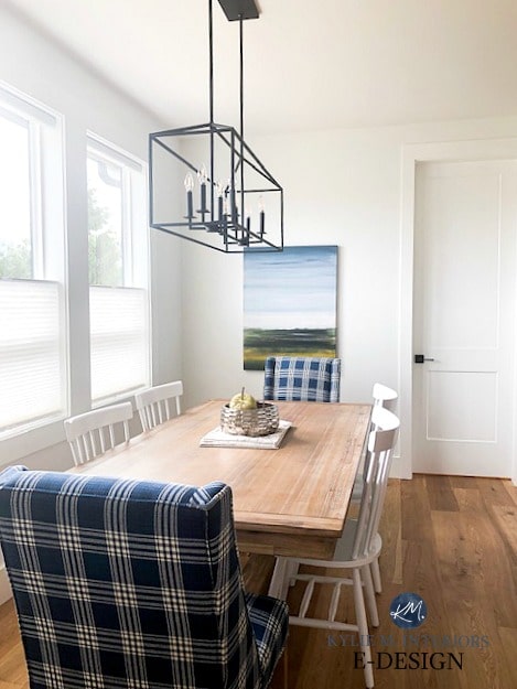 Dining room in farmhouse style. Pier 1 table and upholstered blue chairs. White spindle back chairs Wayfair. Pure White walls. Kylie M Interiors Edesign, online paint colour advice blog