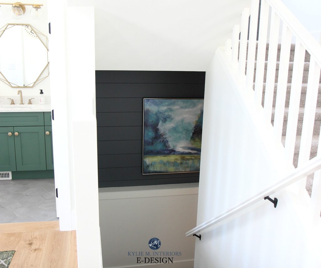 Feature wall in dark staircase using shiplap, art. Powder room with green vanity and walls in Sherwin Williams Pure White. Kylie M Interiors Edesign, online paint colour consulting and advice blog