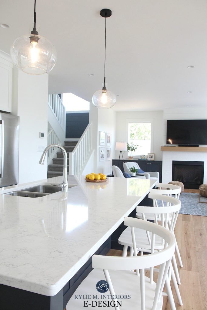 LG minuet white quartz with gray vein countertop, Pure White walls, white stools. Open layout kitchen and living room. Kylie M Interiors Edesign, online paint colour consultant and blogger