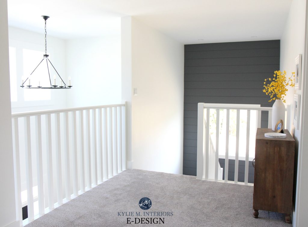 Stair landing with open railings to entryway. Shiplap feature wall in staircase. SW Pure White and Web Gray. Kylie M Interiors Edesign, online paint colour advice blog