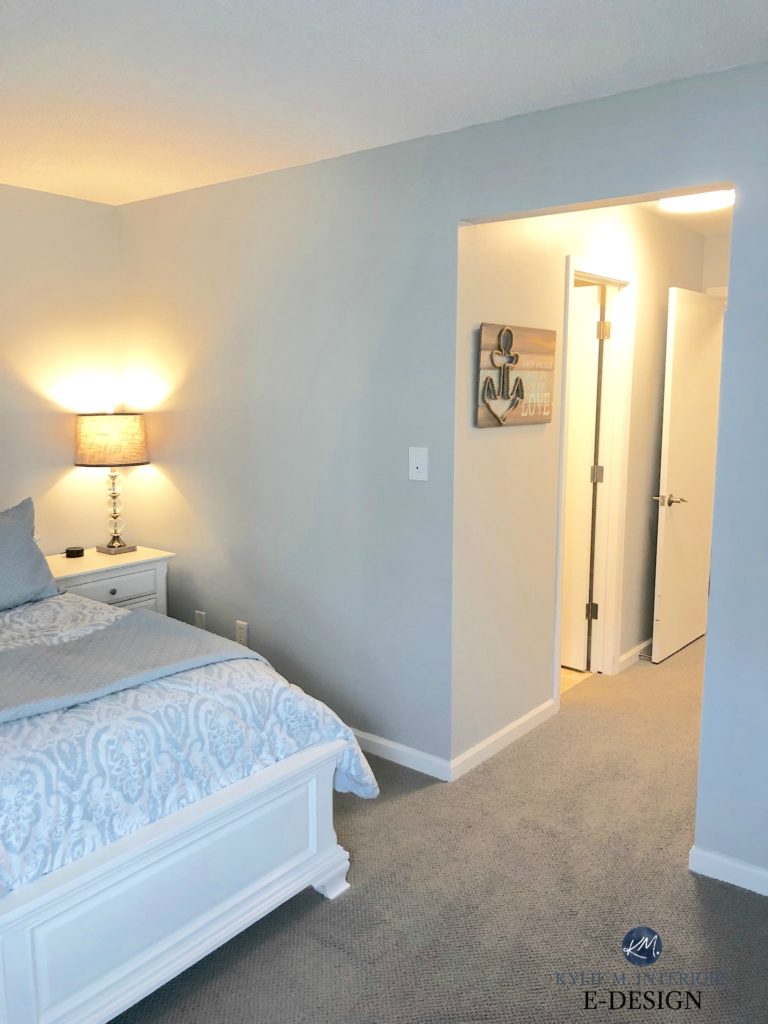 Bedroom with Sherwin Williams Tinsmith best gray paint colour with lights on and gray carpet. Kylie M INteriors Edesign, online paint color consultant