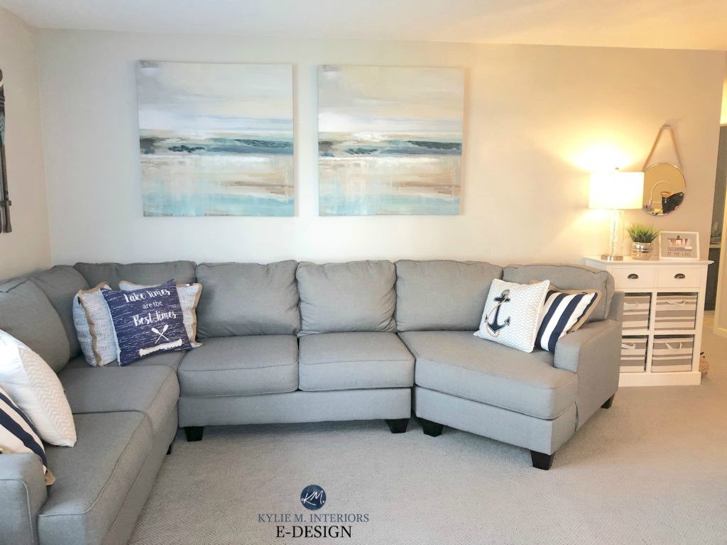 Gray sectional, coastal beach theme living room, warm gray carpet, warm gray paint color on walls. Kylie M Interiors Edesign, online paint colour consulting and advice blogger