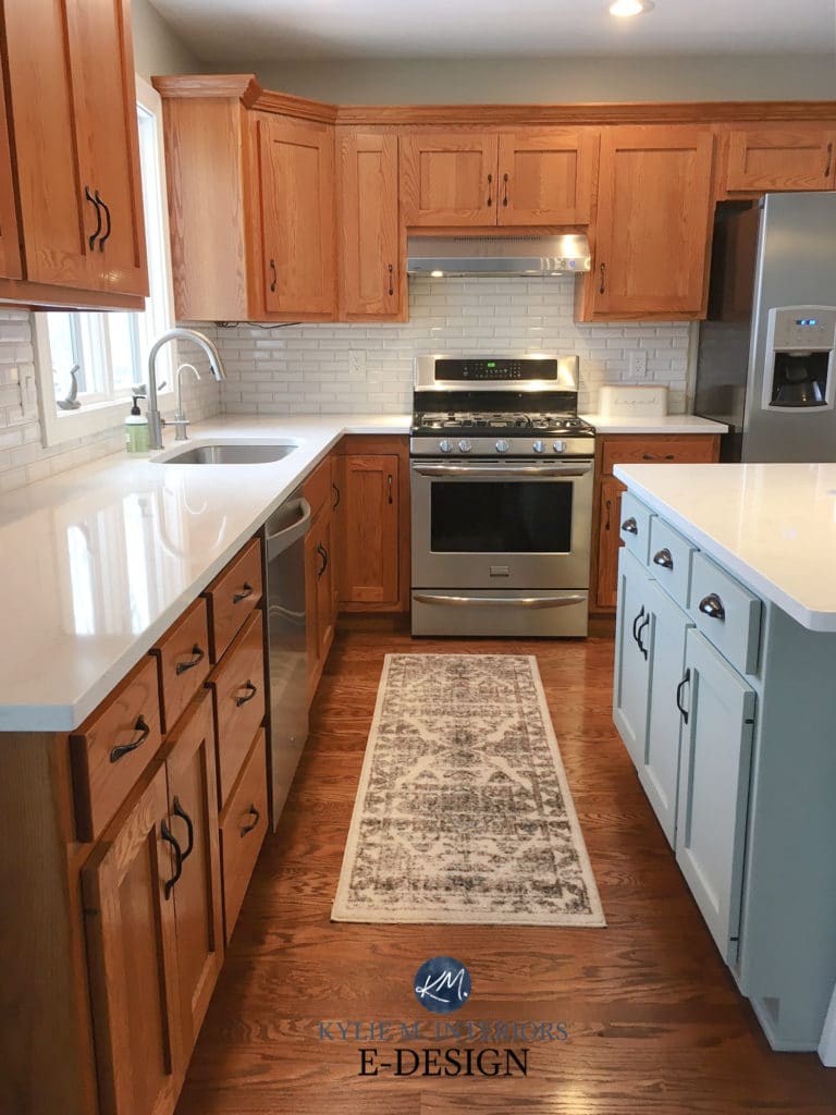 Ideas to update kitchen with oak wood cabinets. Quartz countertop, white subway tile backsplash, painted island. Kylie M Interiors Edesign, blogger diy advice
