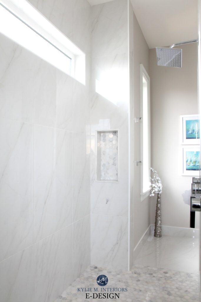 Walk in marble shower with niche or alcove for shampoo. Marble hexagon floor. Benjamin Moore Balboa Mist walls. Kylie M Interiors Edesign, online paint colour consulting