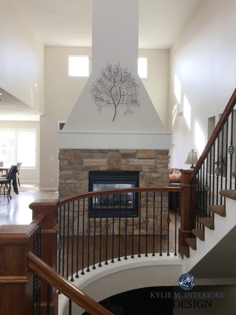 Fireplace with stone and drywall top. Walls painted popular neutral paitn color, Sherwin Williams Canvas Tan. Kylie M Interiors Edesign, diy decorating and design